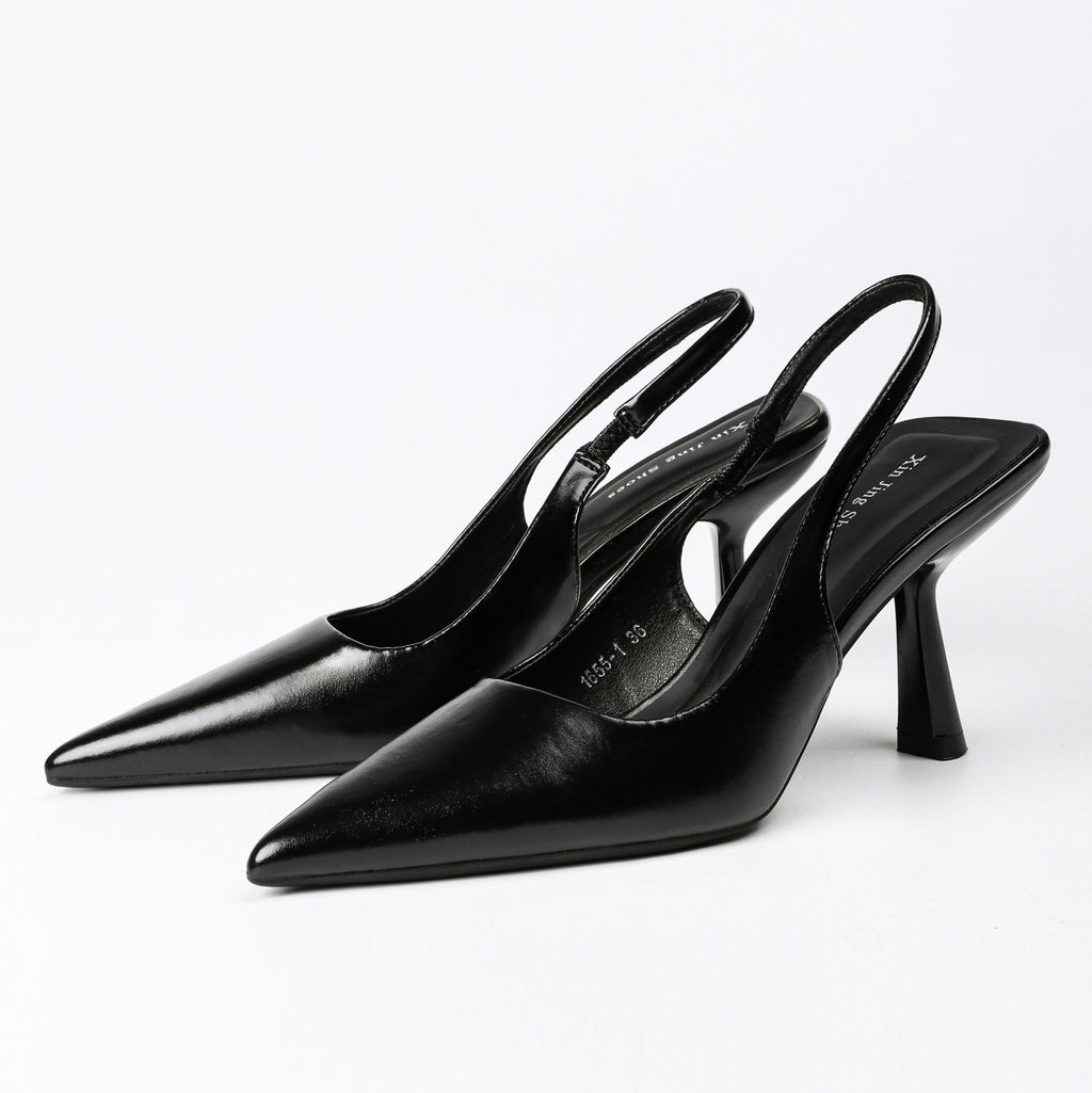Black pointed-toe slingback pumps