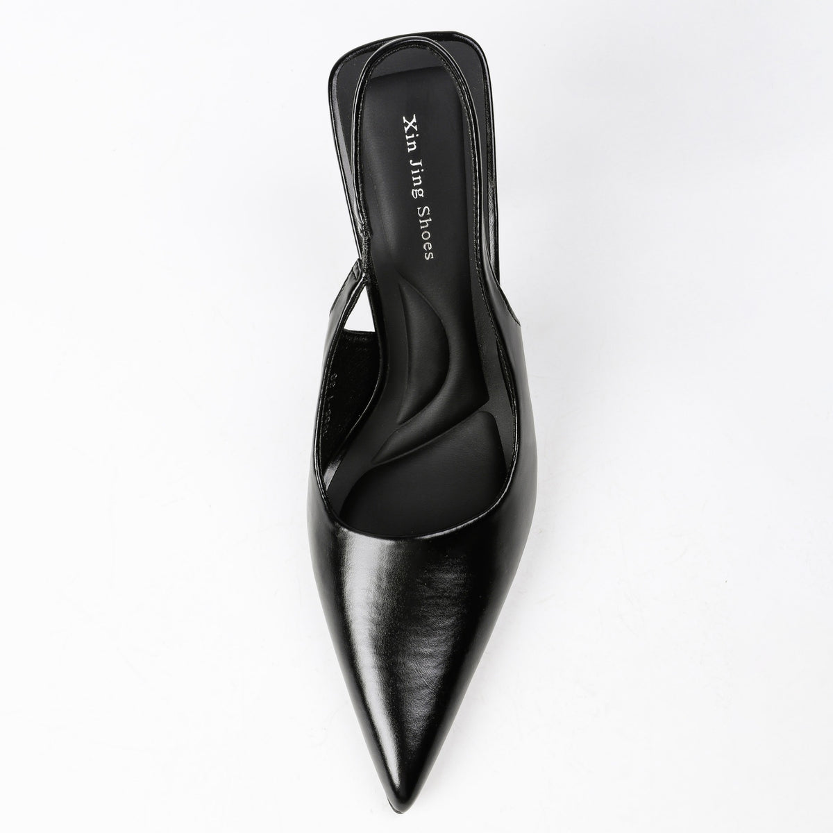 Black pointed-toe slingback pumps pair view
