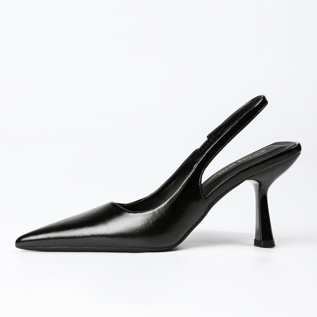 Black pointed-toe slingback pumps top view