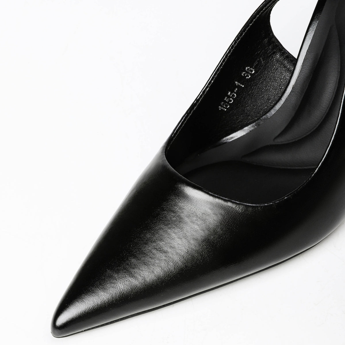 Black slingback pumps side view