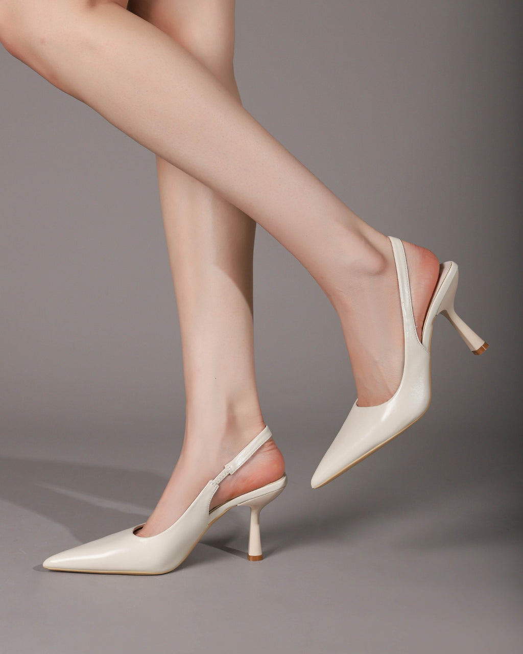 Off-White slingback pumps angled on-foot view