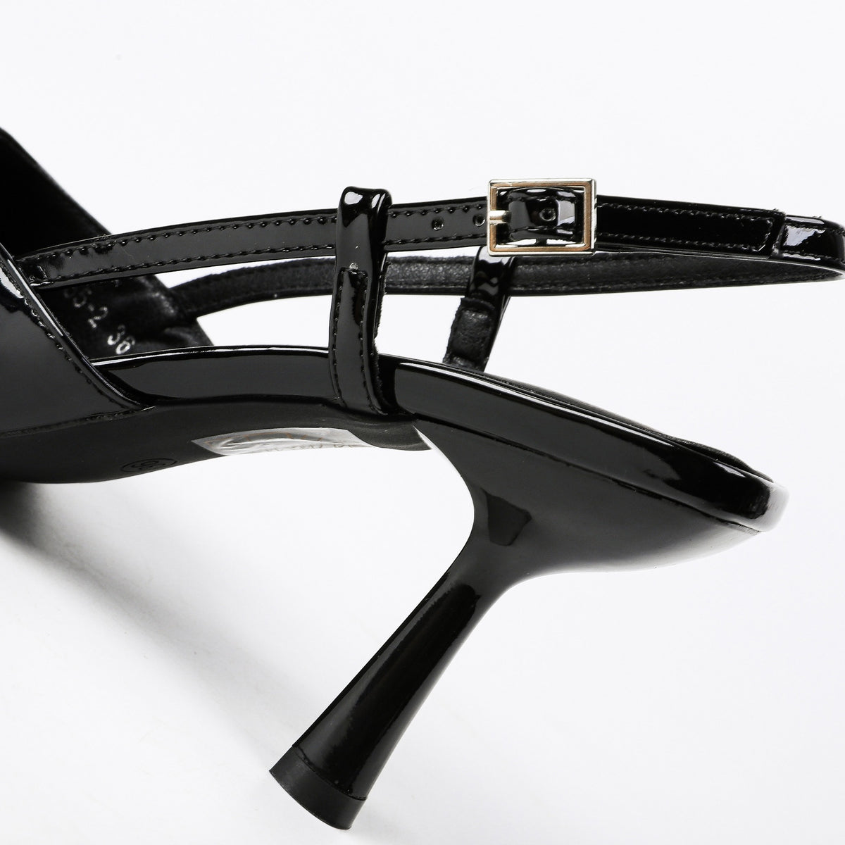 Black patent slingback pumps detail view 1