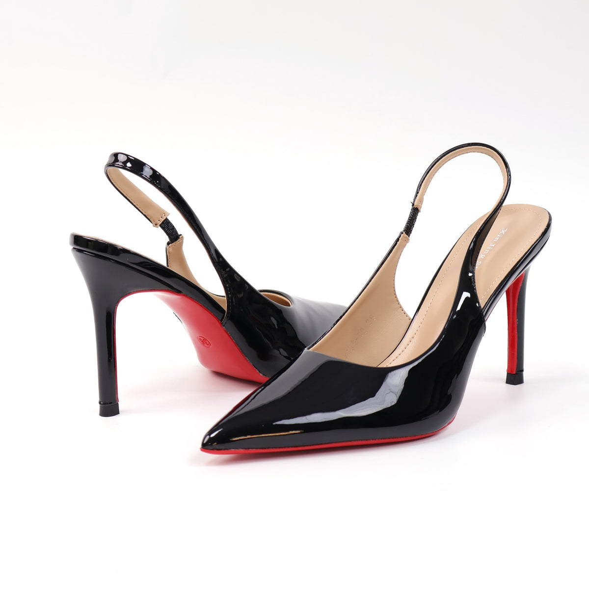 Black pointed-toe patent slingback stiletto pumps