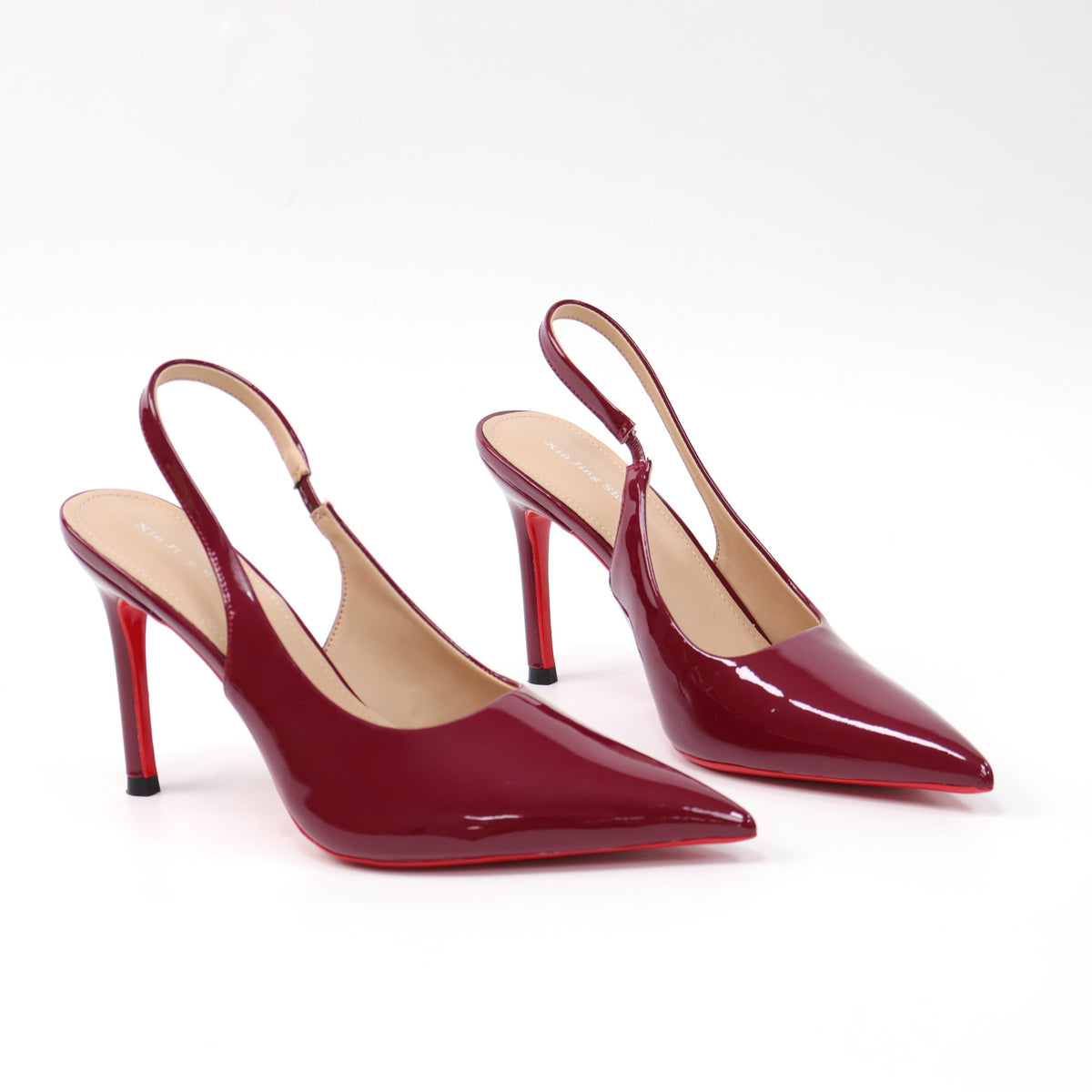 Red pointed-toe patent slingback stiletto pumps