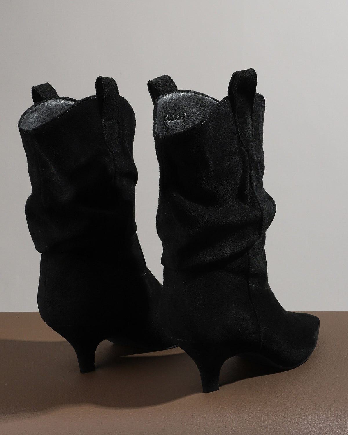 Black pointed toe slouchy fabric ankle boots view 3
