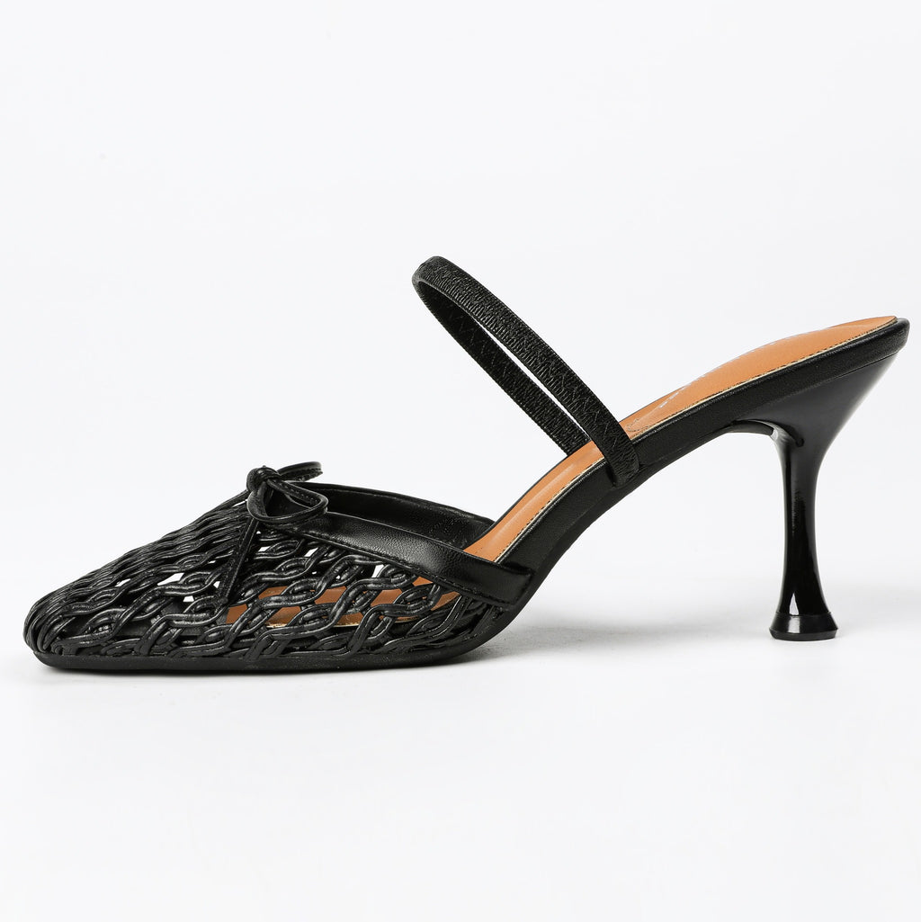 Black woven heeled mule side profile