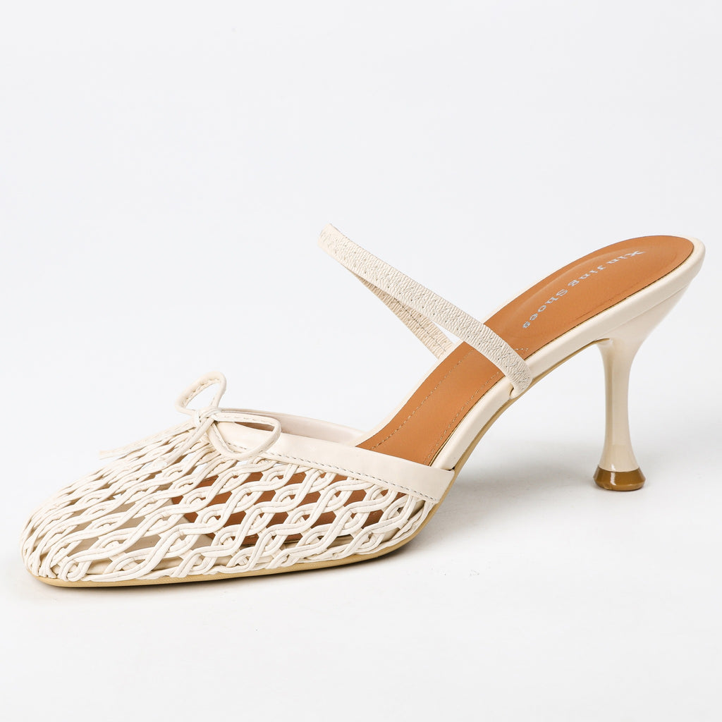 Khaki woven bow high heel mule three-quarter view