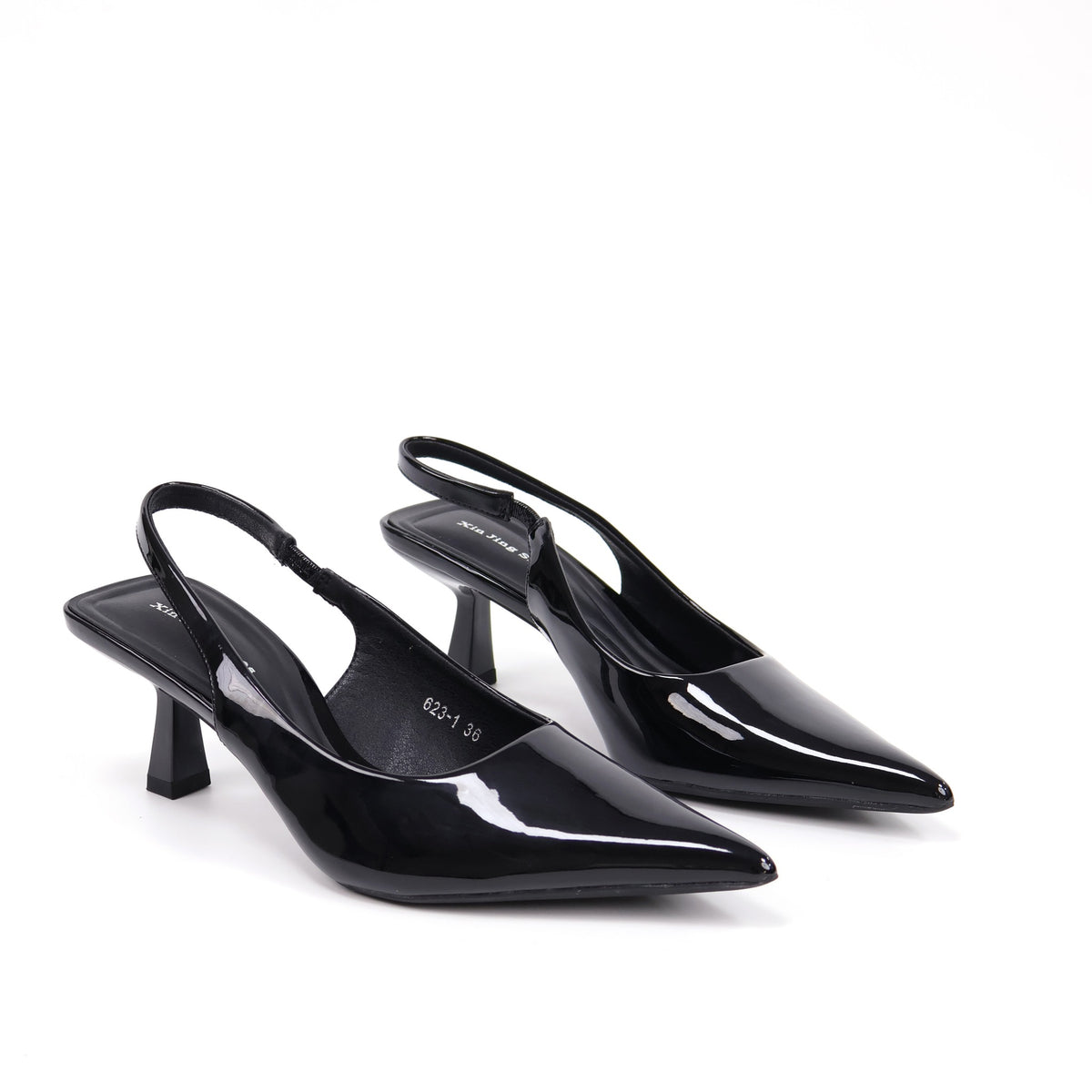 Black pointed-toe patent slingback pumps
