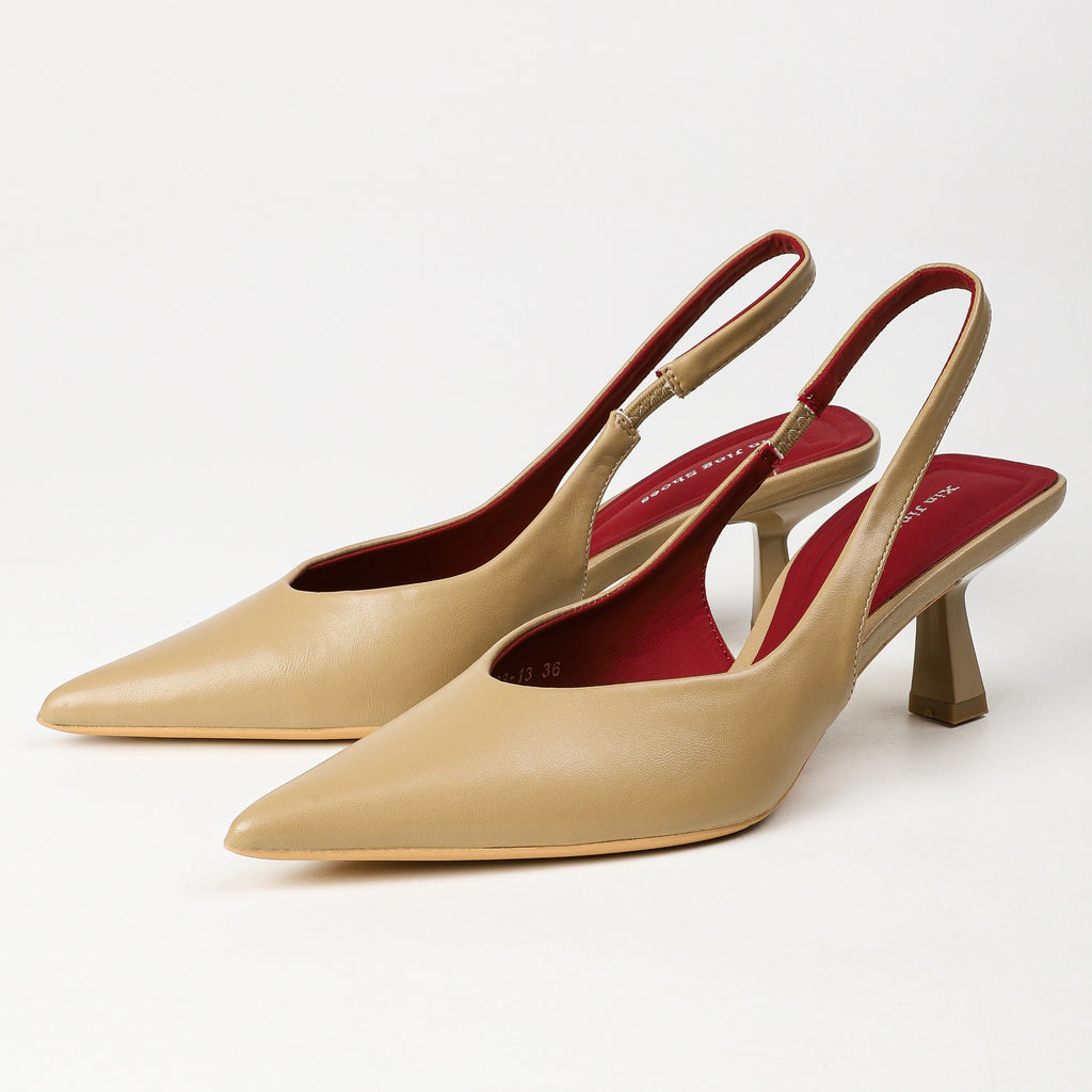 Khaki pointed-toe slingback heels pair studio view
