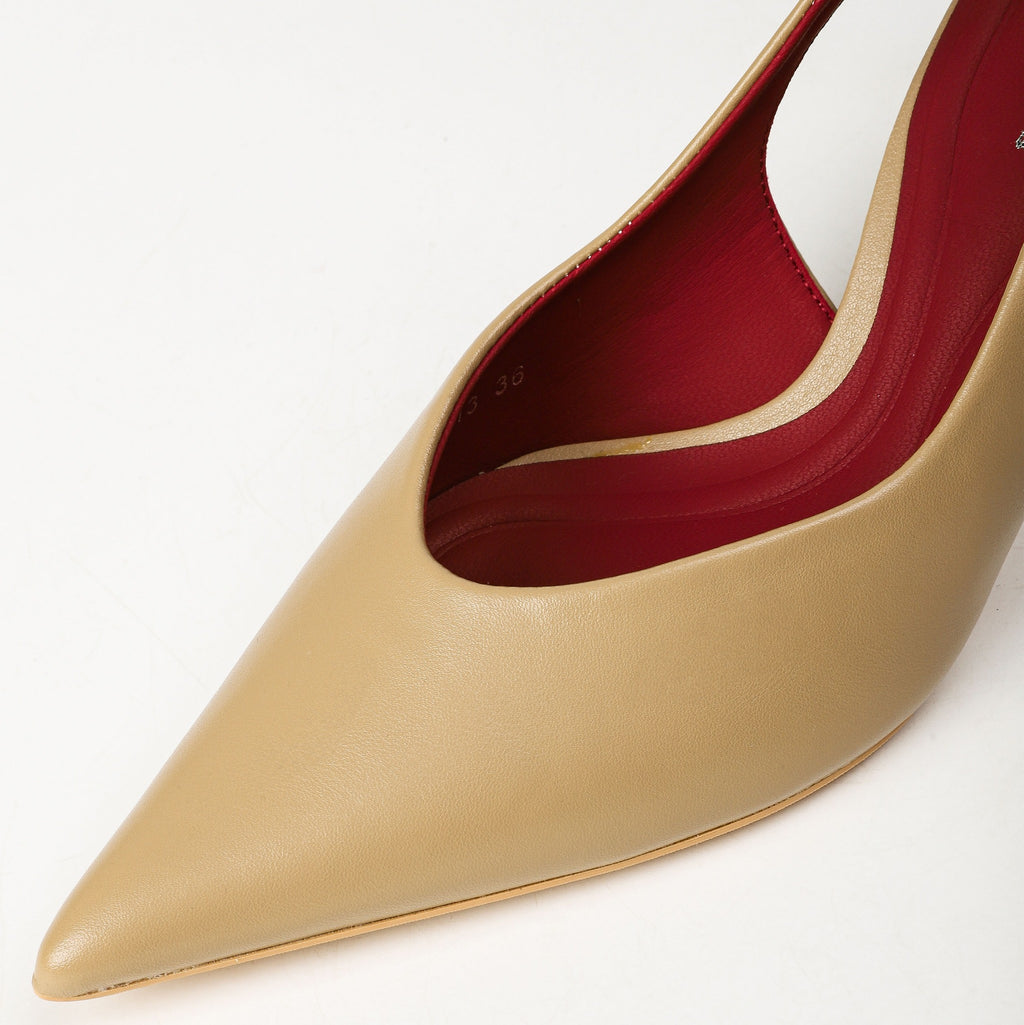 Khaki slingback heel upper and red lining close-up