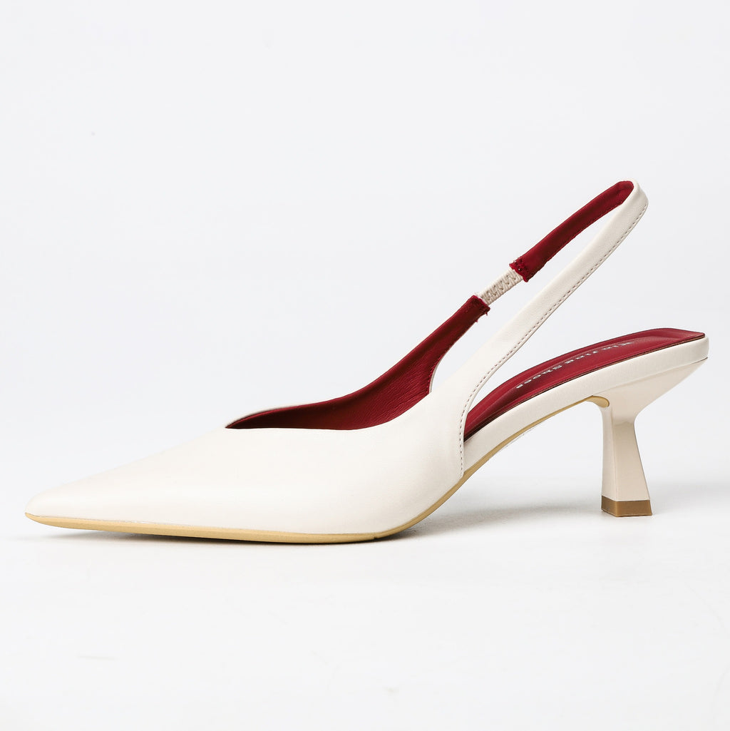 Off-white pointed-toe slingback heel side view