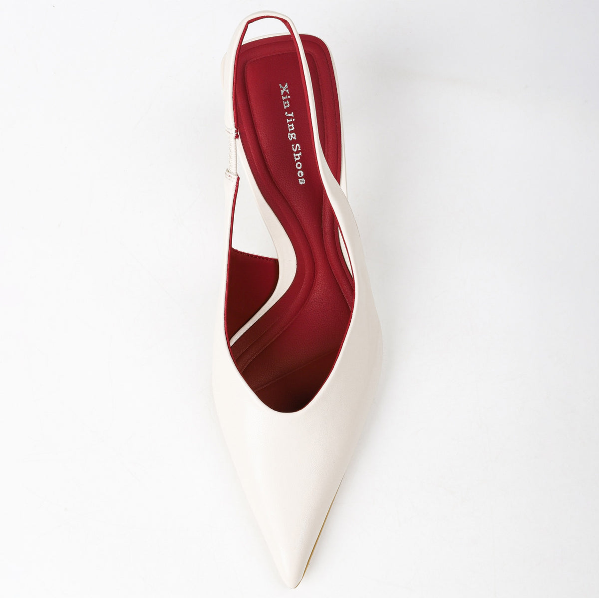 Off-white pointed-toe slingback heel top view