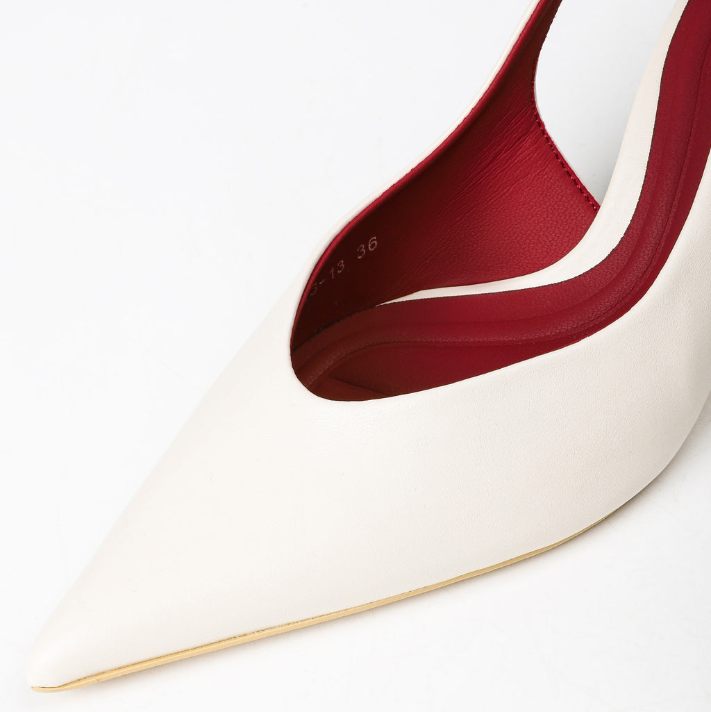 Off-white slingback heel upper material and red lining close-up