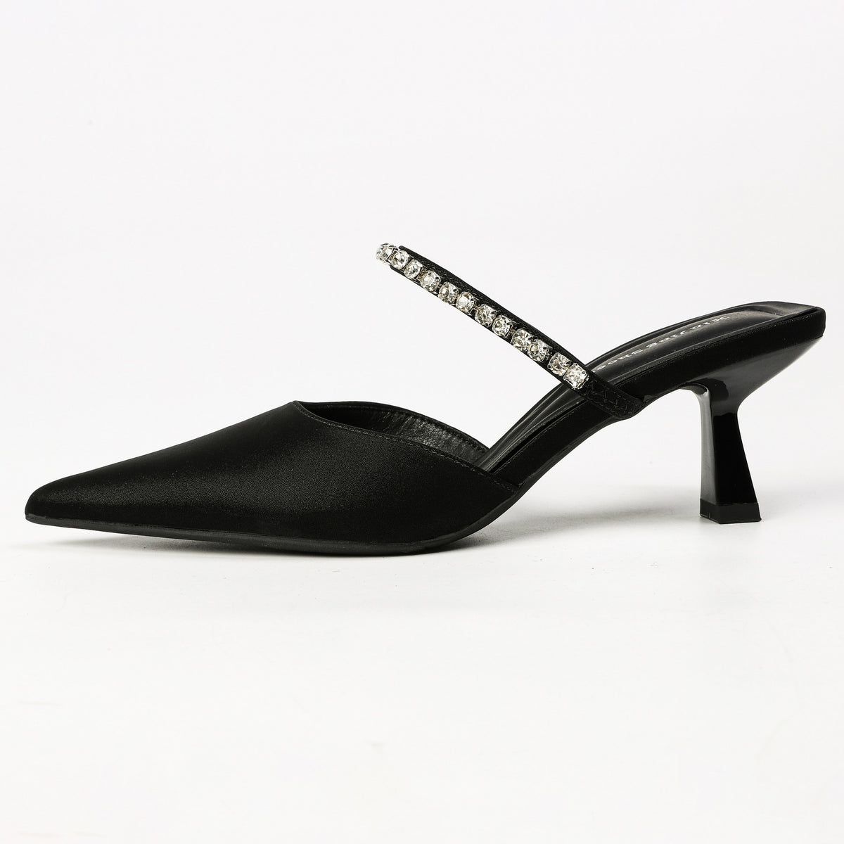 Black heeled mule side profile