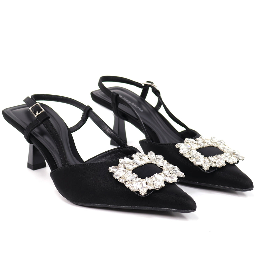 Black pointed-toe crystal buckle slingback heels