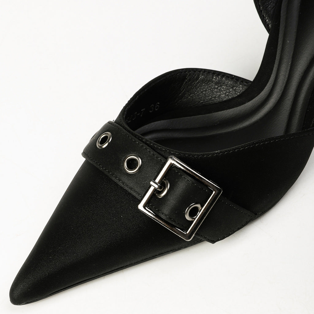 Black buckle strap and silver eyelet close-up