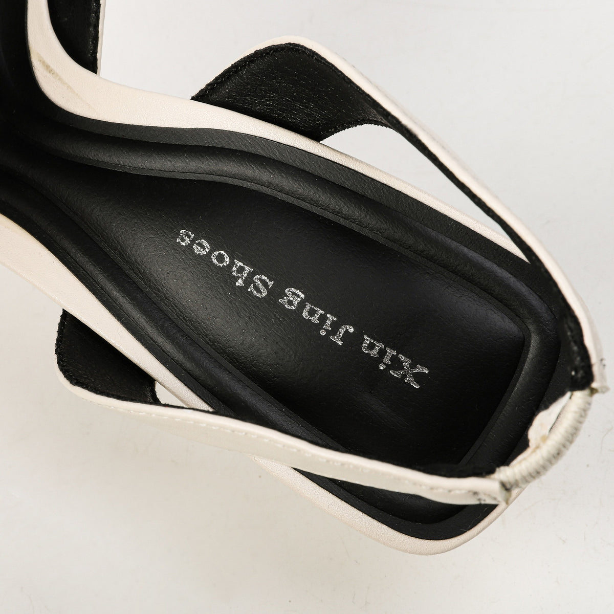 Off-white slingback heel insole close-up
