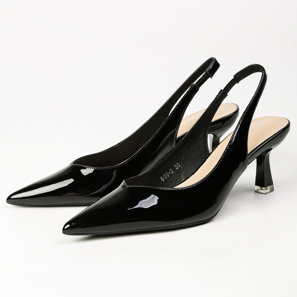 Black patent pointed-toe slingback heels front three-quarter pair
