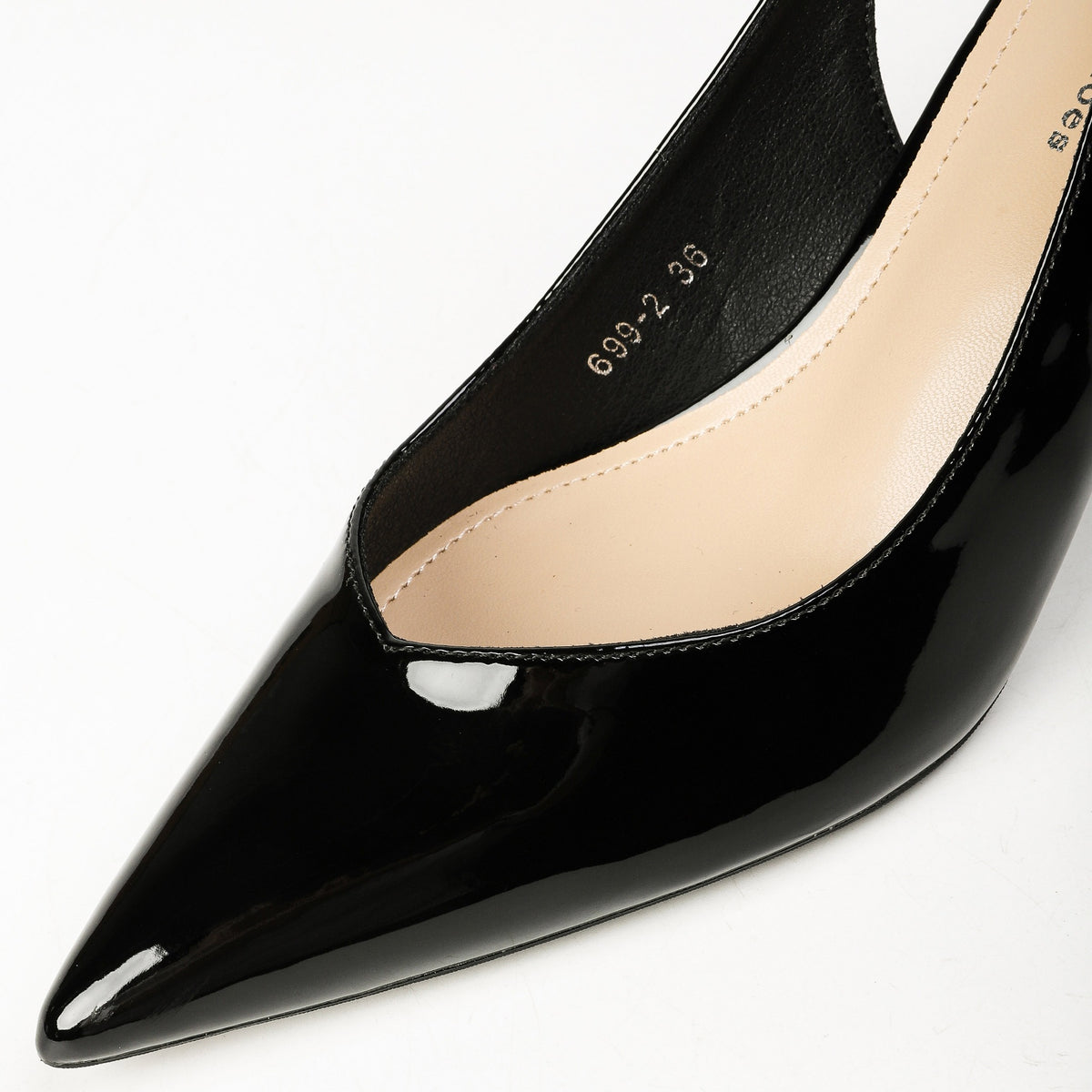 Black patent slingback heel pointed toe close-up