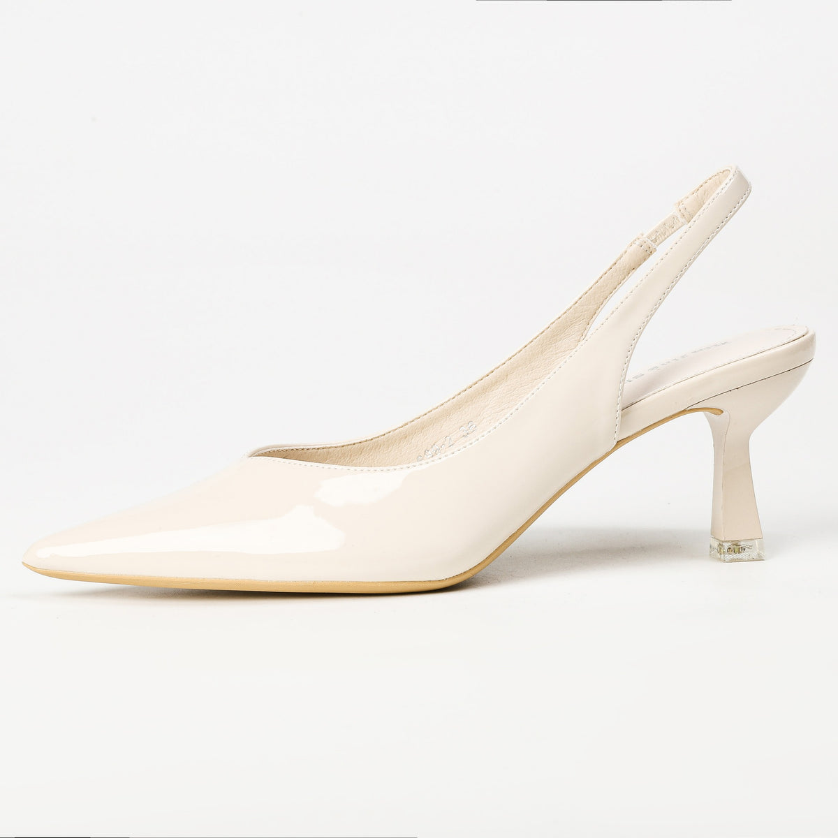 Cream patent slingback heel side view