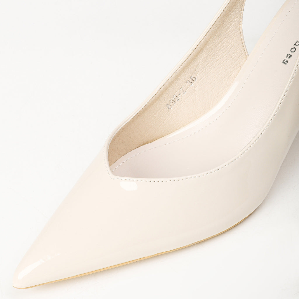 Cream patent slingback heel pointed toe detail