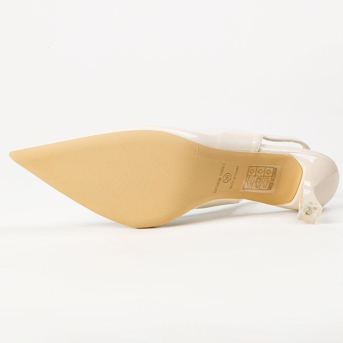 Cream patent slingback heel outsole detail
