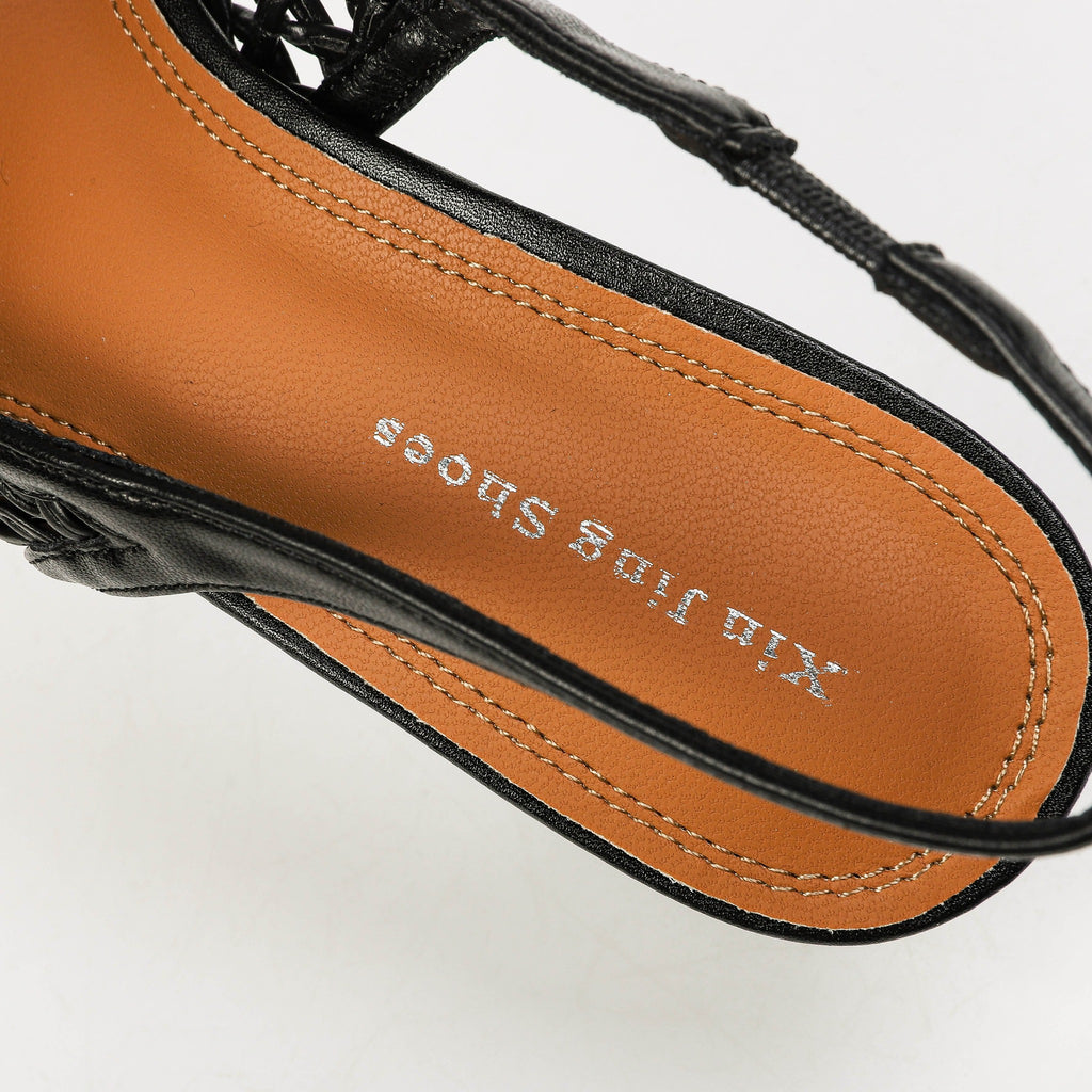 Black slingback insole and strap close-up