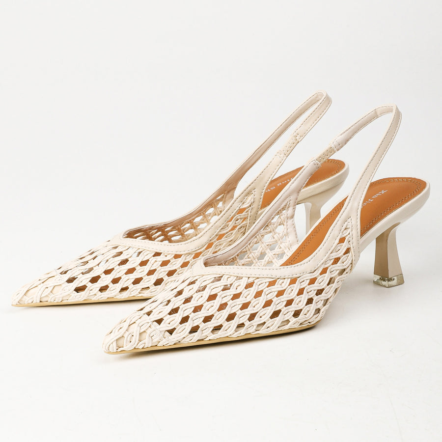 Off-white pointed-toe woven slingback heels pair front angle