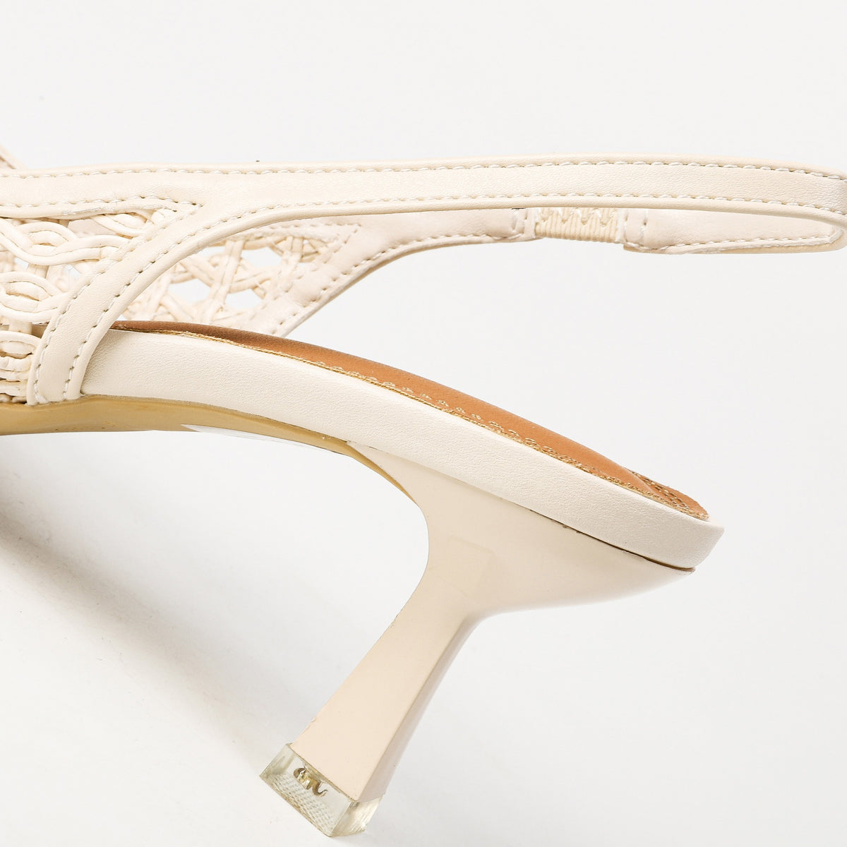 Off-white slingback heel and elastic strap close-up