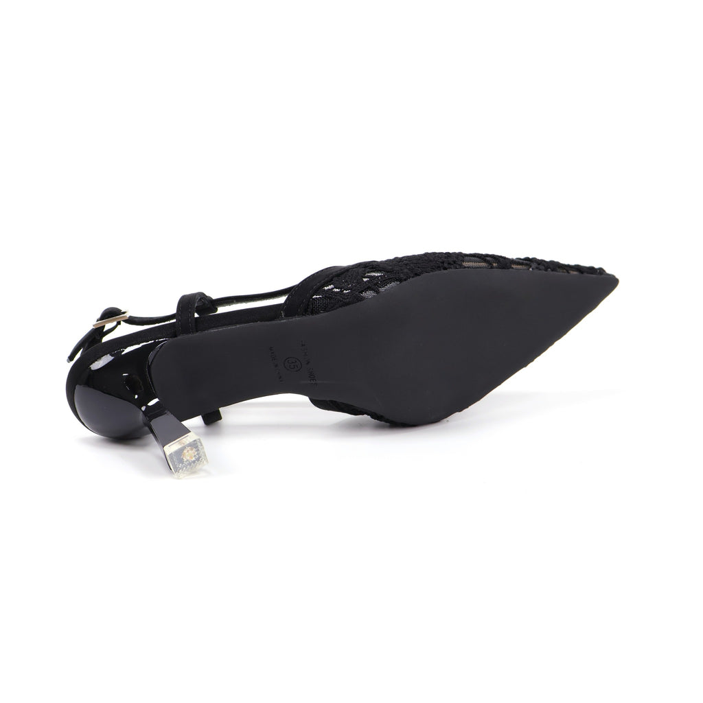Black pointed-toe slingback heel outsole view