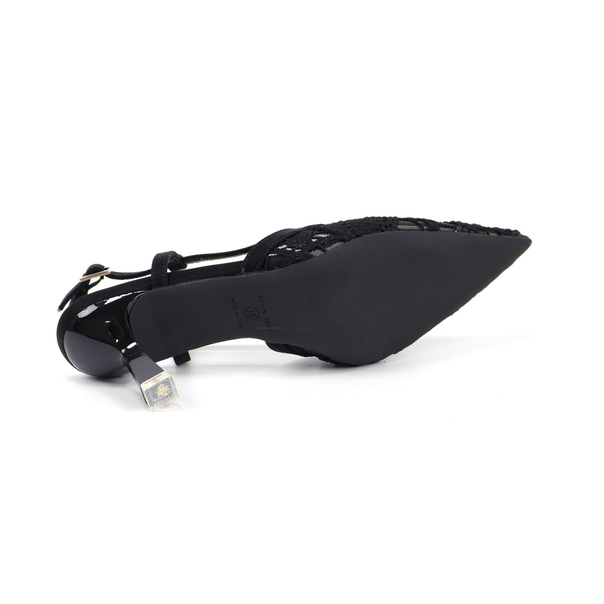 Black pointed-toe slingback heel outsole view