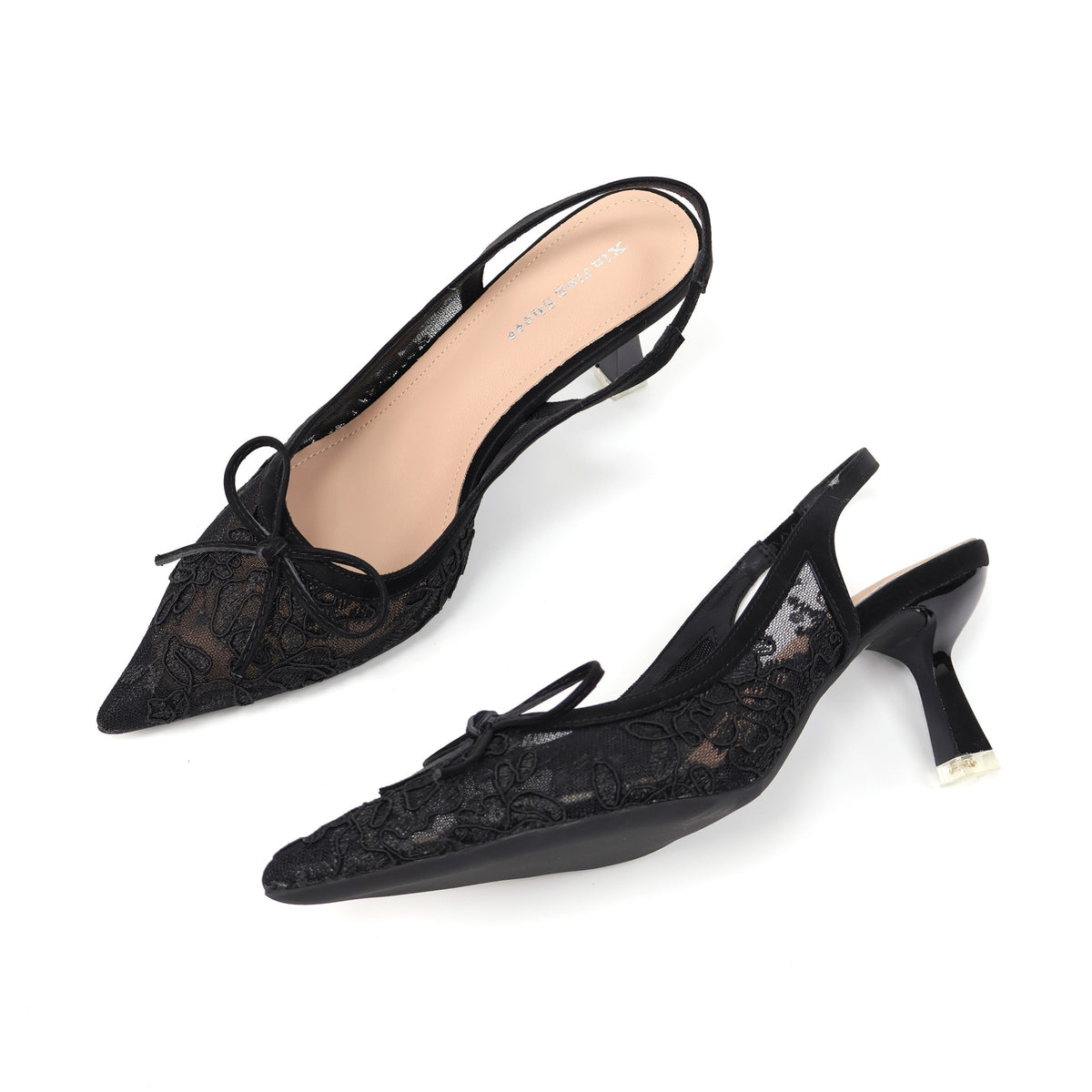 Black pointed-toe embroidered mesh slingback pumps angled view