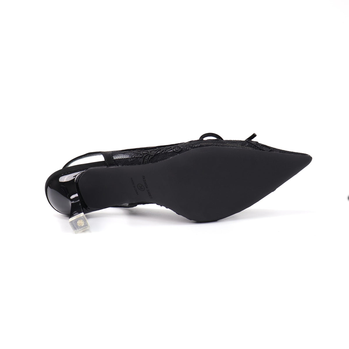 Black pointed-toe embroidered mesh slingback pumps sole view