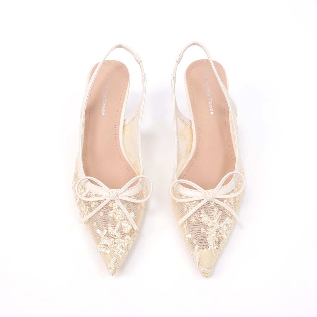 Off-white pointed-toe embroidered mesh slingback pumps top view