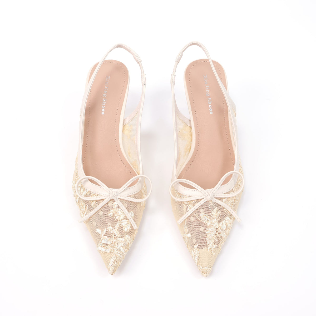 Off-white pointed-toe embroidered mesh slingback pumps top view