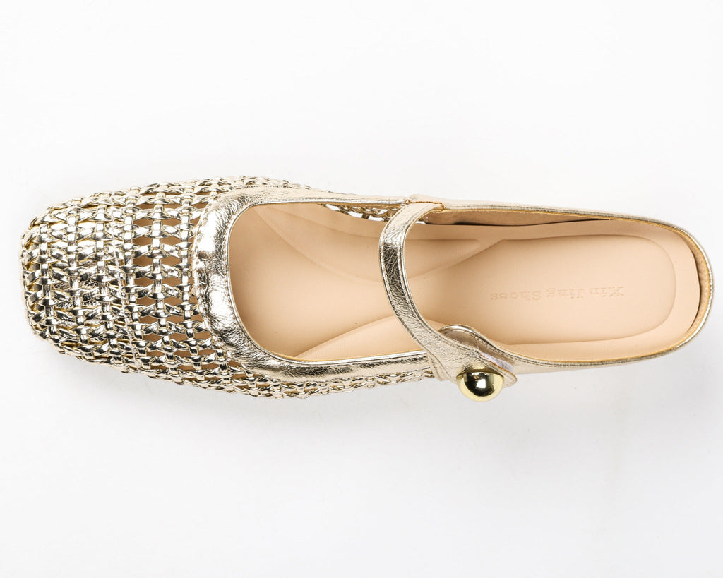 Gold woven Mary Jane mule flat from above showing footbed and instep strap