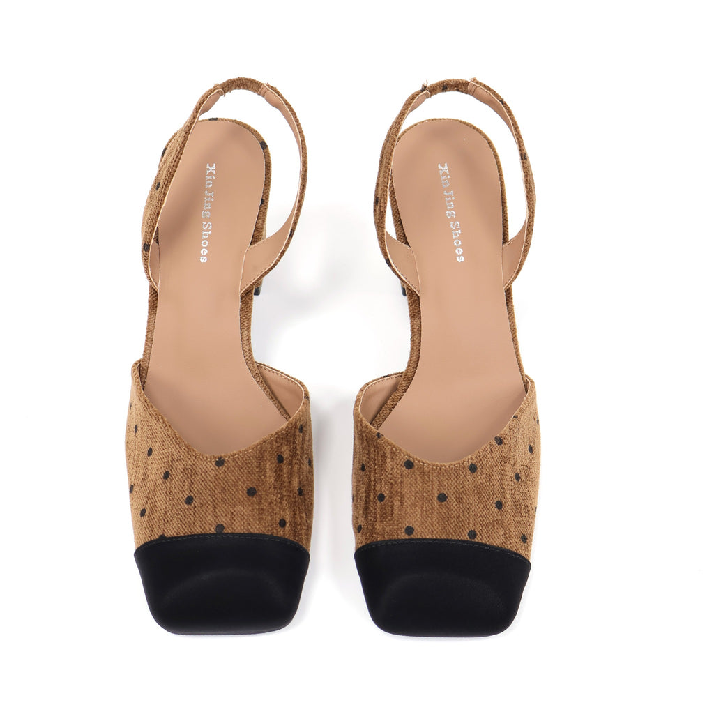 Brown square-toe slingback heel outsole view