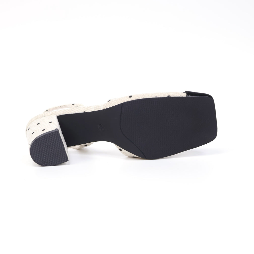 Off-white square-toe slingback heel outsole view