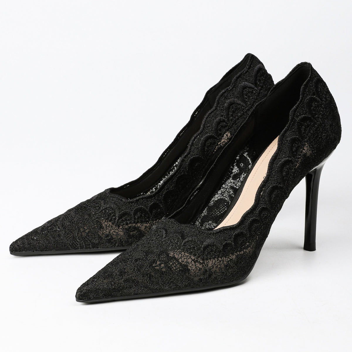 Black floral lace stiletto pumps, pair view
