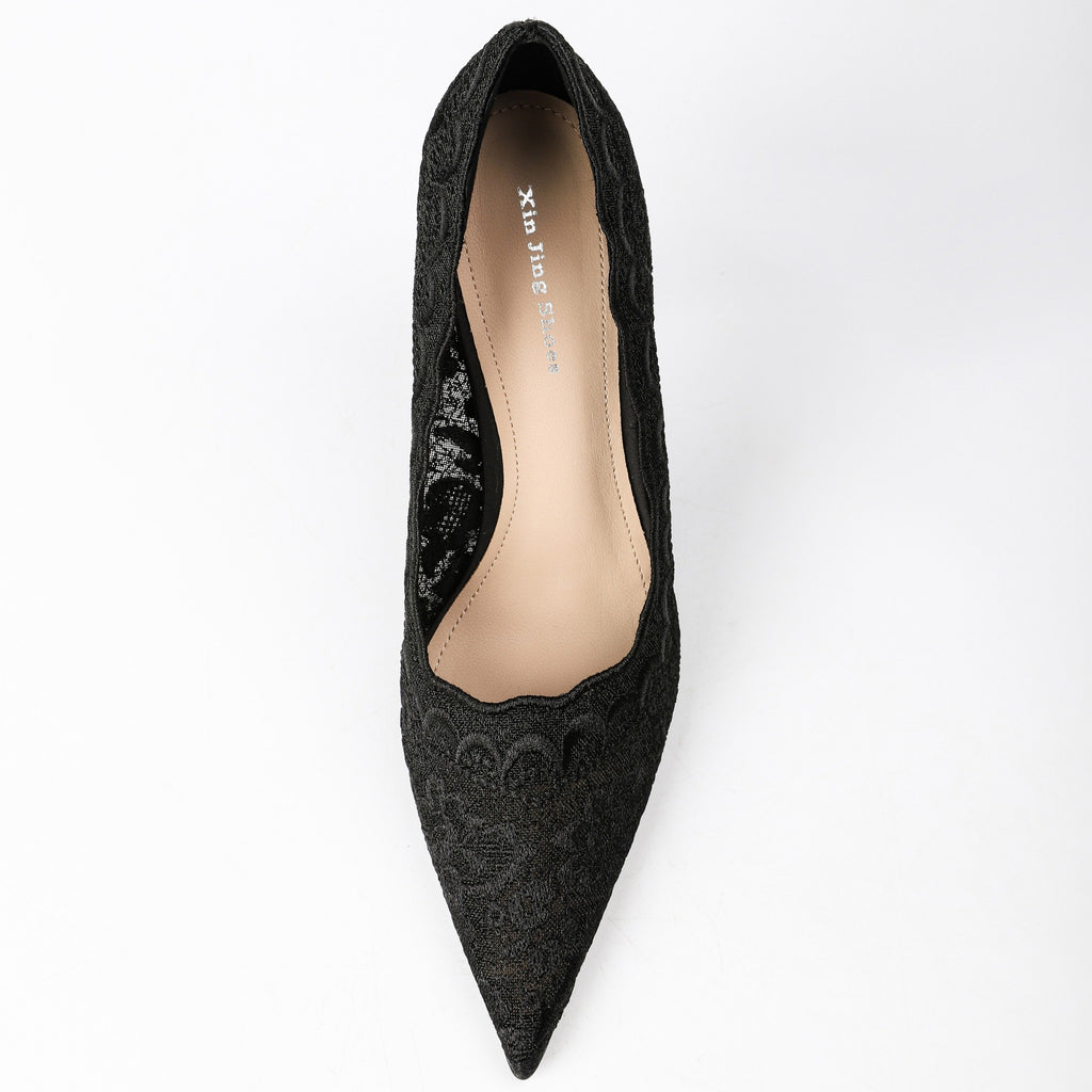 Black floral lace pumps top view