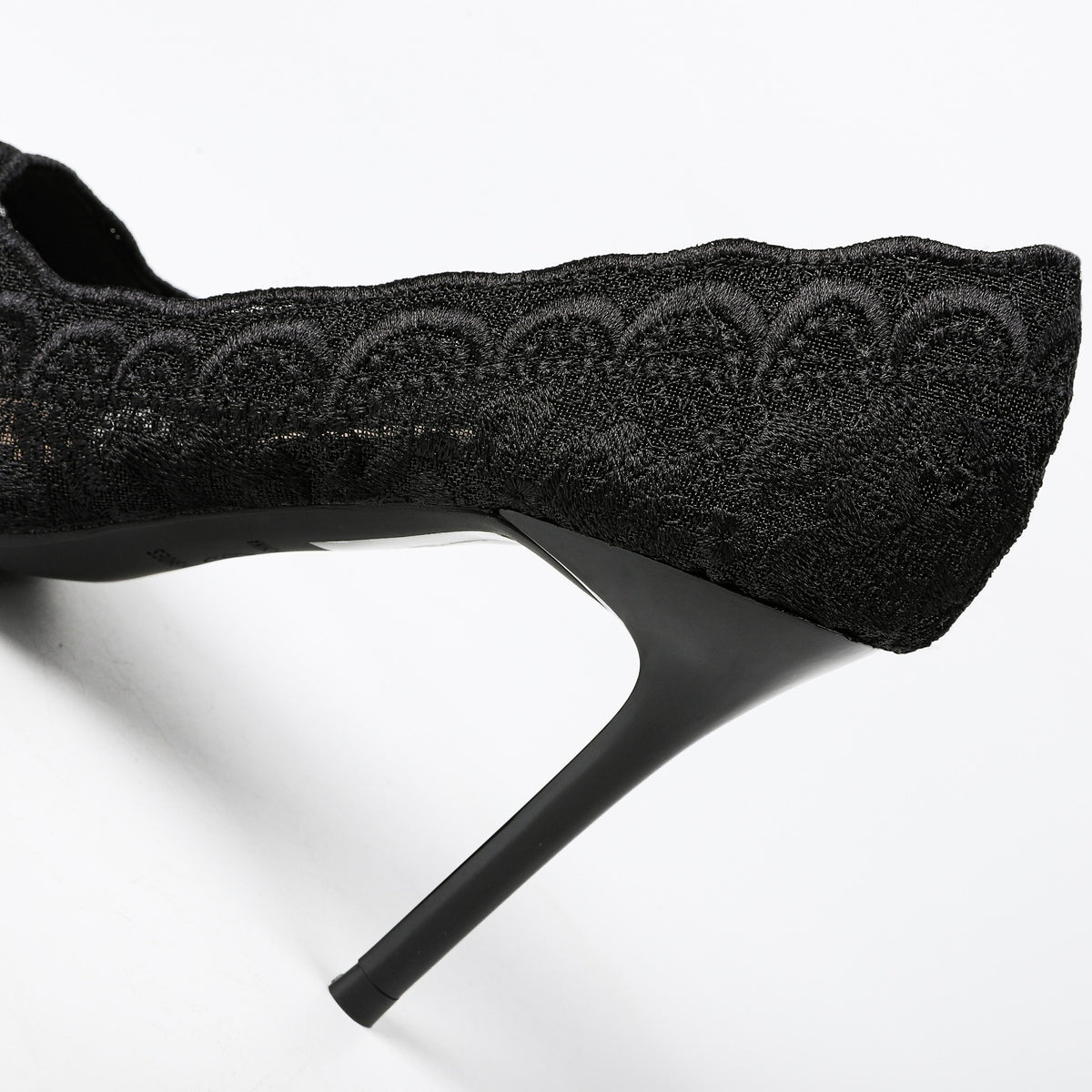 Black lace pump heel and scalloped edge detail