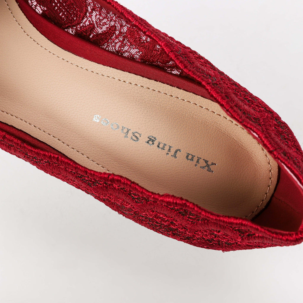 Red floral lace pump insole detail