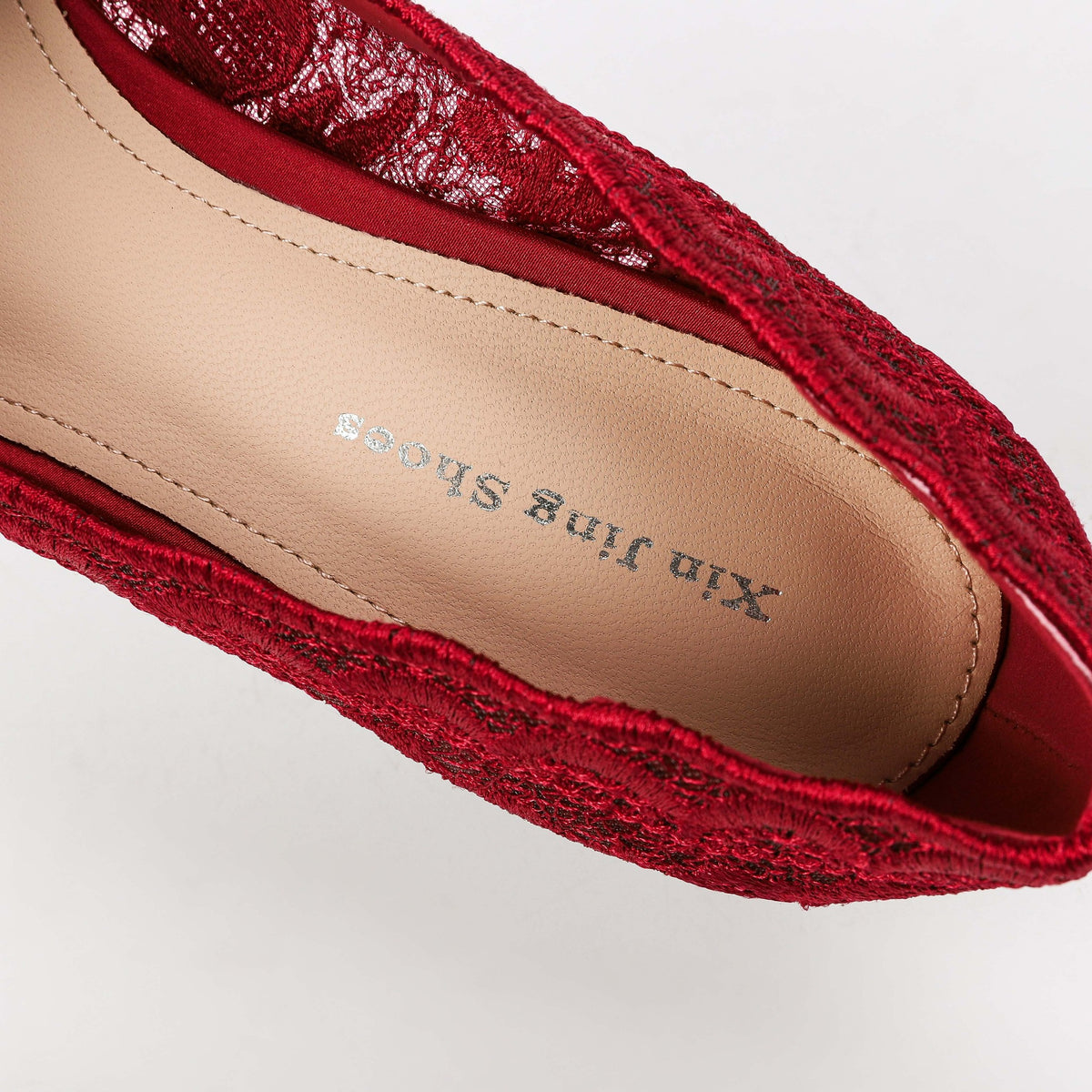 Red floral lace pump insole detail