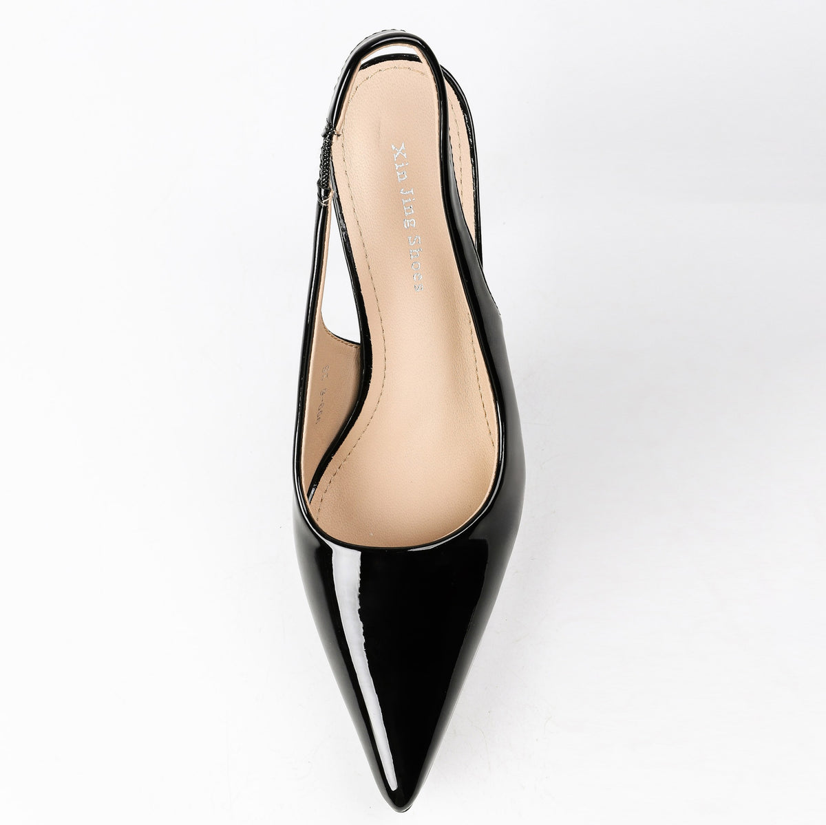 Black pointed-toe slingback pumps top view